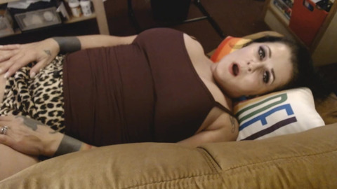 Tired Milf on The Couch Yawning