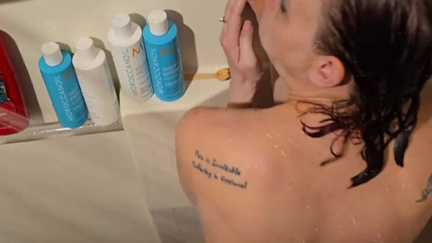 Secret Shower Video    WAIT —  WHAT IS SHE DOING?