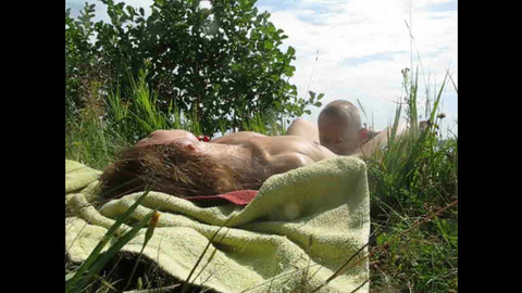 Russian MILF gets a multi orgasm from cunnilingus and blowjob with a stranger on a public beach