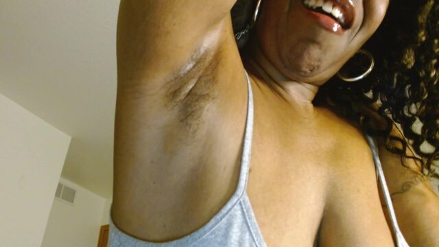 Black domme dominates with a soaked, sloppy armpit kiss