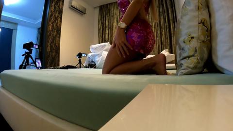 Sexy cougar flaunts exposed cleavage, bushy pubes, and plump rear in designer attire for XXX session
