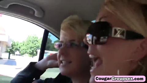 Two senior women enthusiastically engulf thick shafts, engage in uninhibited foursome fornication.