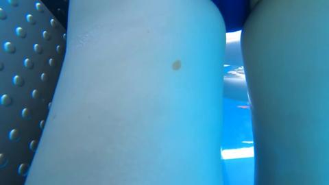 Big-titted babe soaks up sun in skimpy swimsuit before getting pounded on poolside sex fest