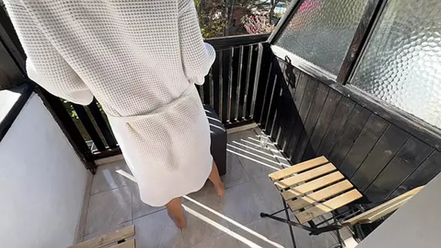 Thick cream pie spread on open balcony