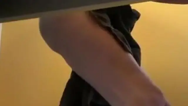 Teen girl undressing in pool cabin